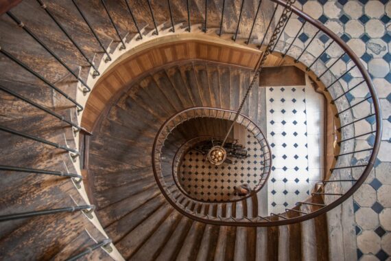 Top view of the architectural element of the spiral staircase in the gallery of Vivienne