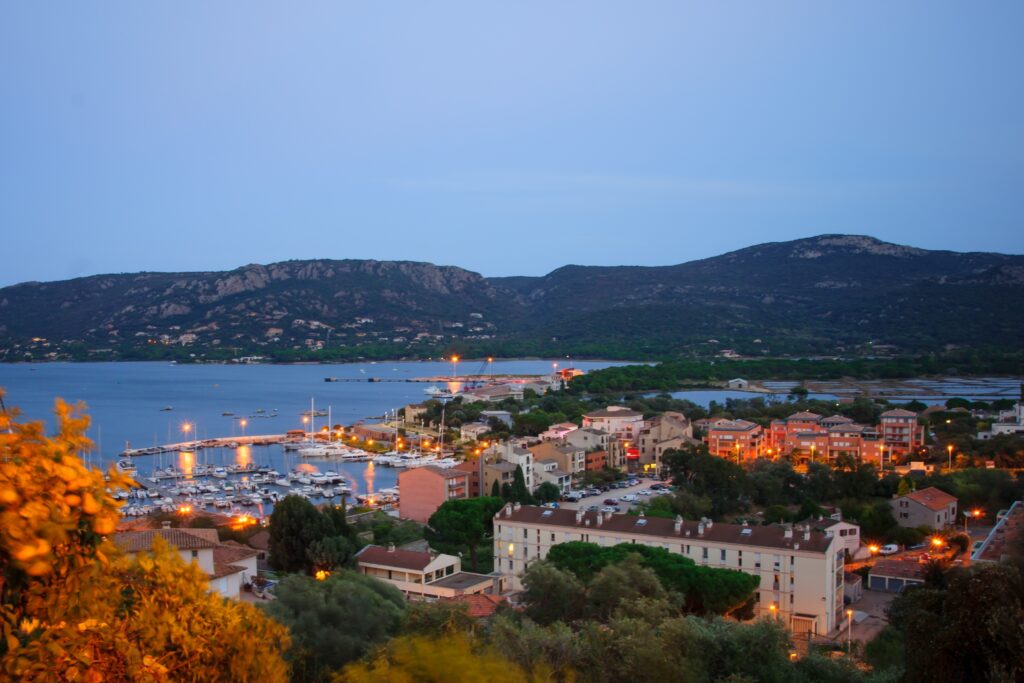 View of the Marina of Porto Vecchio at sunset in Corsica, France 